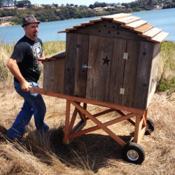 Mobile chicken tractor designed for urban gardening, offering a portable solution for free-range poultry in small spaces.